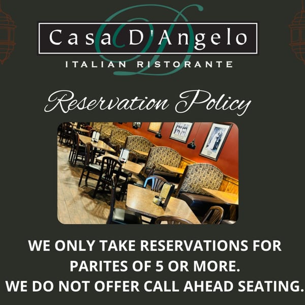 Casa D'Angelo's reservation policy with an image of the restaurant's dining area.